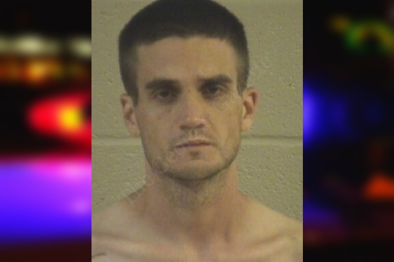 Day after shoplifting arrest, Dalton man arrested for harassing cars in